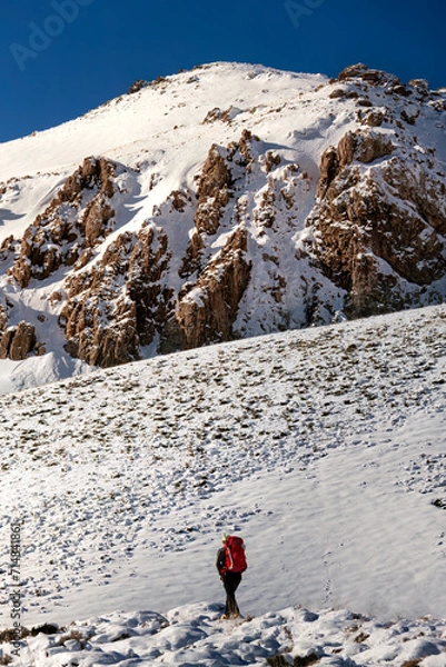 Obraz hiker in winter mountains