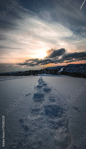Obraz sunset over the snow steps