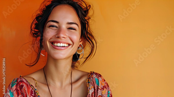 Fototapeta Joyful Woman With a Radiant Smile Expressing Happiness