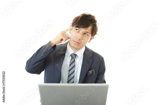 Fototapeta 苦悩するビジネスマン