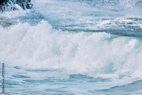 Fototapeta Wave splashing close-up. Crystal clear sea water, in the ocean in San Francisco Bay, blue water, pastel colors.