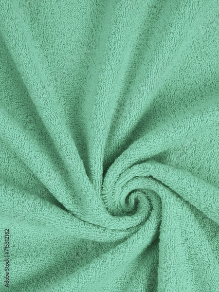 Fototapeta texture of a colored towel. emerald color. neon