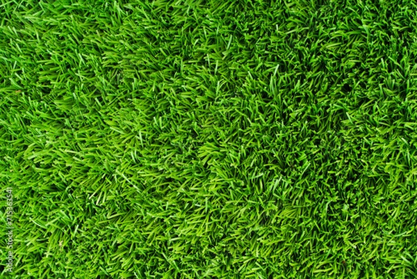 Fototapeta Top of view Close up of vibrant green artificial grass turf in residential.