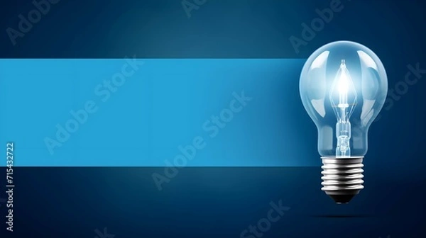 Obraz Lightbulb concept with blue background and copy space - 16:9 format