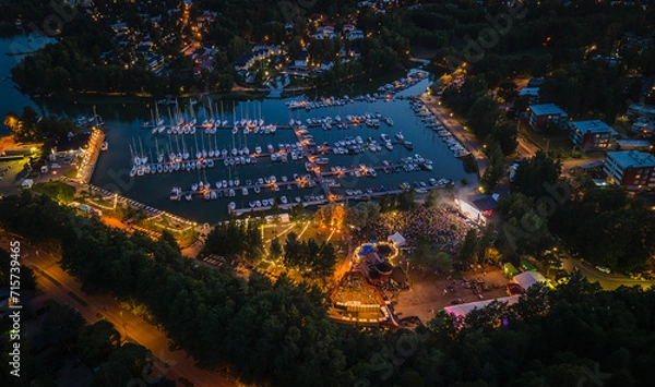 Obraz Evening aerial view of a festival in Espoo with colorful lights
View to dock with reflecting sunset sky