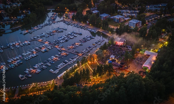 Obraz Evening aerial view of a festival in Espoo with colorful lights
View to dock with reflecting sunset sky