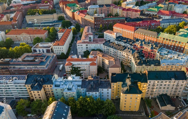 Obraz Aerial close view to Helsinki central residental area. Multistory buildings. Colorful roofs in Scandinavia. Finland sunset