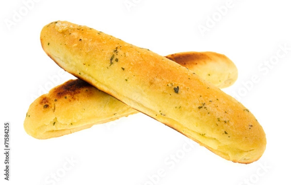 Obraz Garlic bread sticks with one overly done