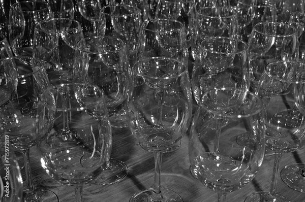 Fototapeta Empty crystal glasses on a wooden table. Bar and Restaurants