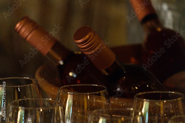 Fototapeta Bottles of Rose Wine with Glasses. Bar and Restaurants