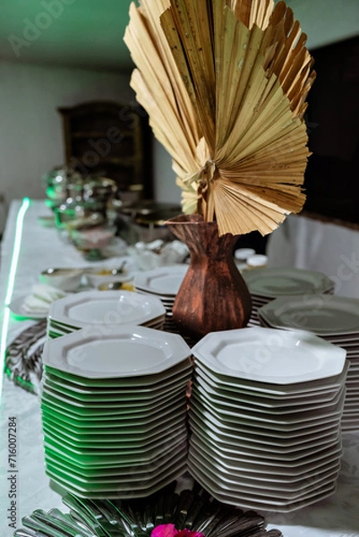 Obraz a buffet table with white porcelain plates