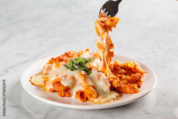 Fototapeta Cheesy pasta pull