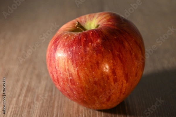 Fototapeta red apples on a wooden table 14