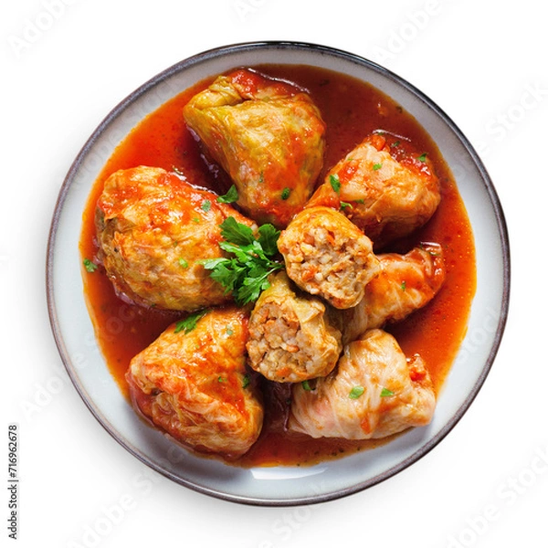 Fototapeta Cabbage Rolls with Ground Meat, Rice and Vegetables also known as Sarma, Golubtsy, Dolma on White Background Isolated