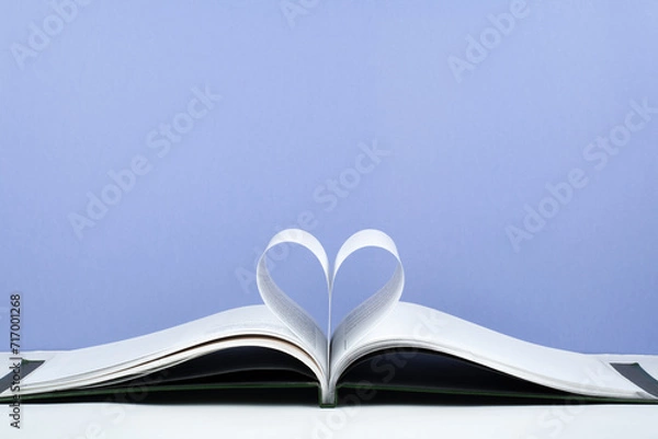 Obraz Old open hardback book, page decorate into a heart shape for love in Valentine's. love with open book heart.