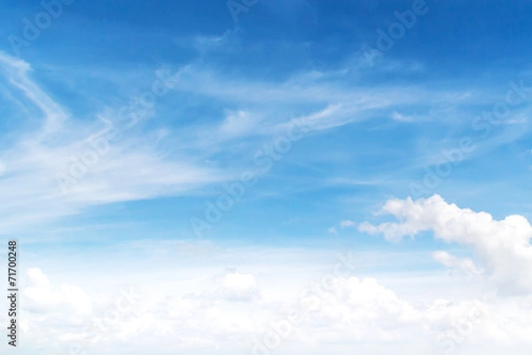 Fototapeta Fantastic soft white clouds against blue sky