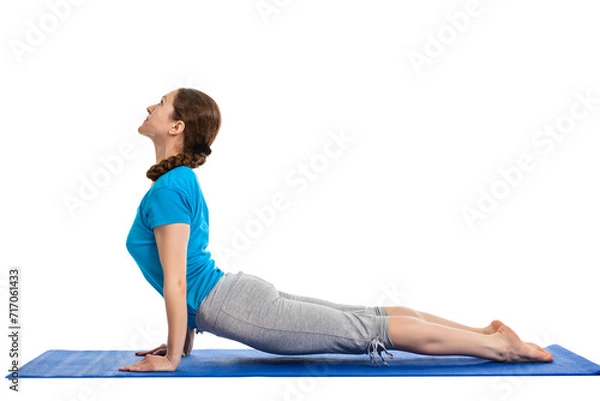 Fototapeta Yoga - young beautiful woman yoga instructor doing Upward Facing Dog Pose (Back Bend) (Urdhva Mukha Svanasana) asana exercise isolated on white background