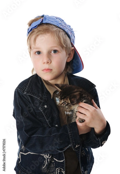 Obraz Young boy cuddling pet cat