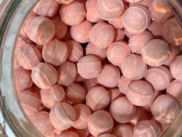 Obraz Top view close up of many pink bubble patch in a jar