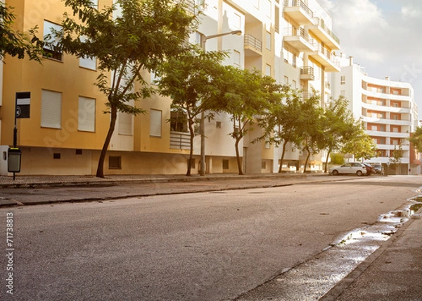 Obraz Empty street road in city with buildings