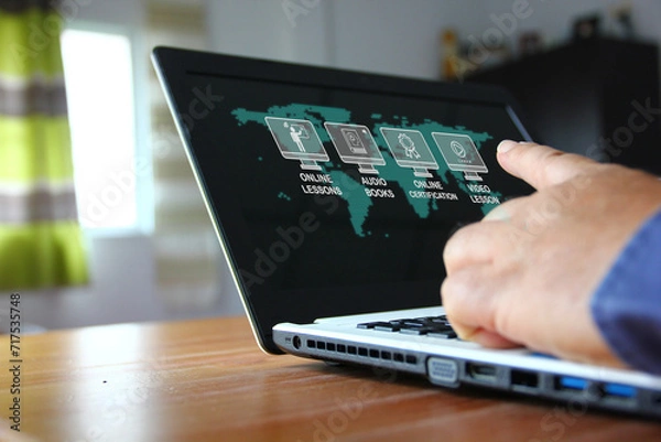 Fototapeta worker develop own potential  using laptop searching e learning service