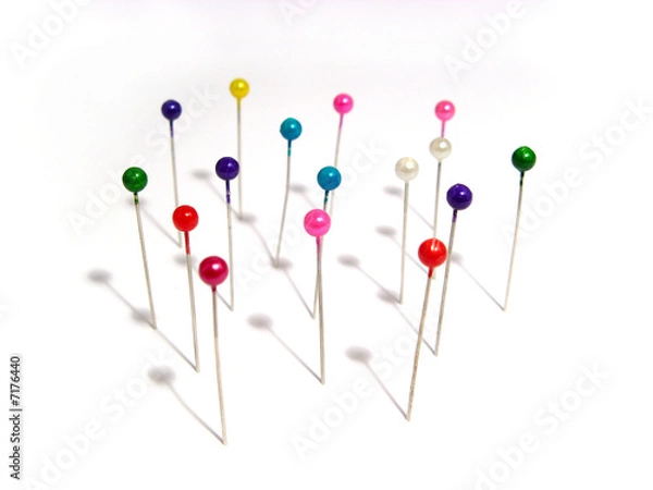 Fototapeta needles with colored heads isolated on white background