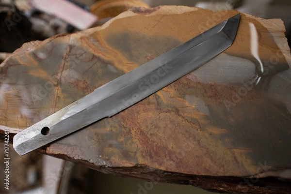 Fototapeta making tanto knife process with wet stone