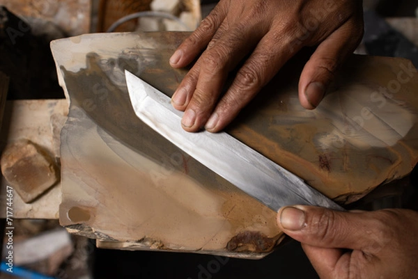 Fototapeta making tanto knife process with wet stone