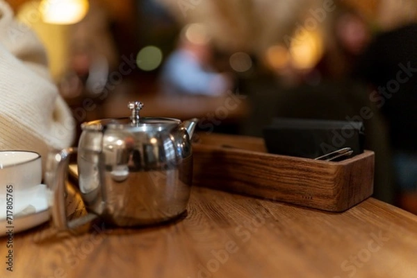 Obraz teapot and cup on the table