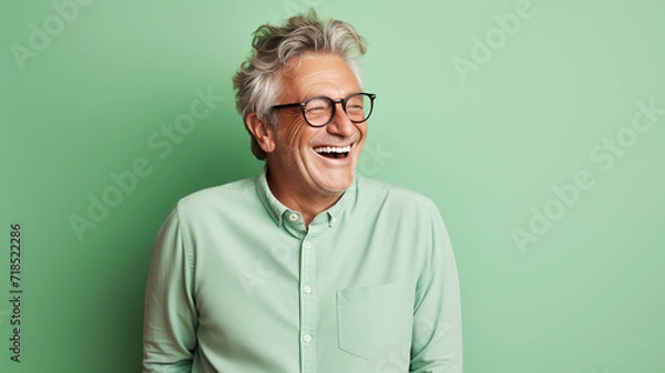 Obraz Happy smiling middle aged adult man on a solid background