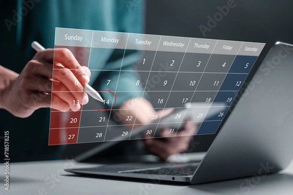 Fototapeta Agenda meeting appointment activity information concept. Highlight appointment reminders and meeting agenda on virtual calendar. Businessman use laptop to manage time for effective work.
