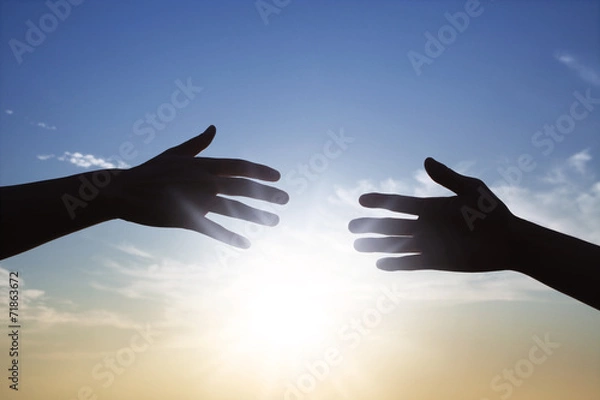 Obraz 太陽の光と2人の手