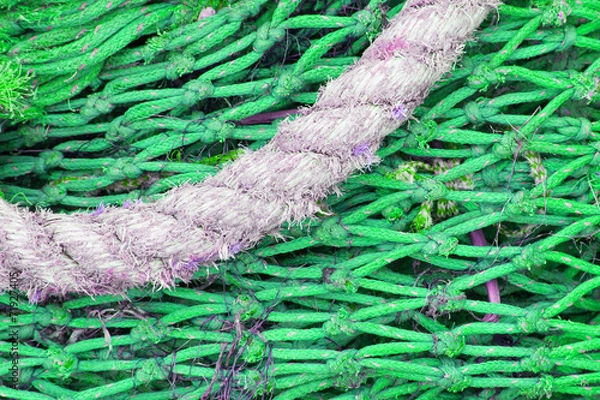 Fototapeta Abstract background with a pile of fishing nets