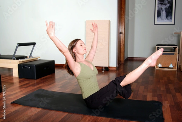 Obraz Pilates Pose Floor Excercise Professional Instructor