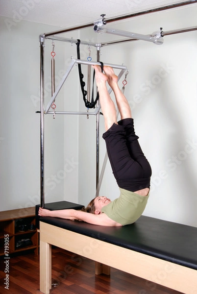 Obraz Professional Pilates Instructor on Cadillac Convertible