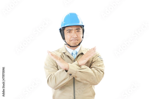 Obraz 疲れた表情の作業員