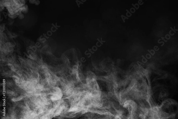 Fototapeta Blur white water vapour on isolated black background. Abstract of steam with copy space.  Smoke on black background. Steam flow.