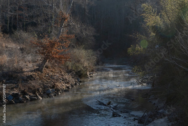 Obraz Stream with fog rising in fall