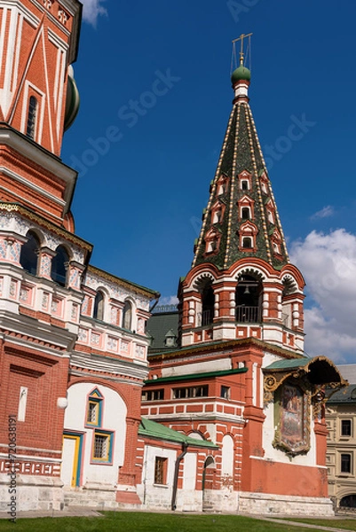 Fototapeta A fragment of St. Basil's Cathedral against the blue sky.