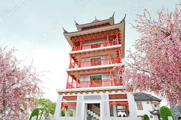Obraz Red Building and Sakura flowers