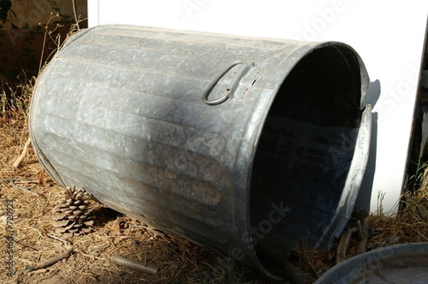 Fototapeta old metal garbage trash can