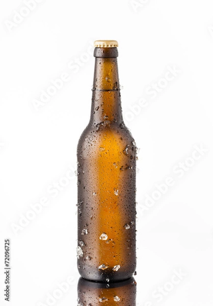 Obraz Bottle of ice cold beer with ice and drops