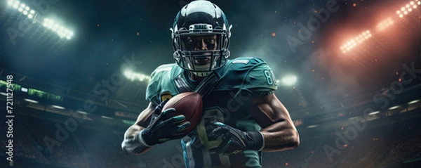 Fototapeta American football player on night stadium dark colors. action picture.  wide banner