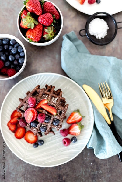 Obraz Chocolate Waffles with berries top view