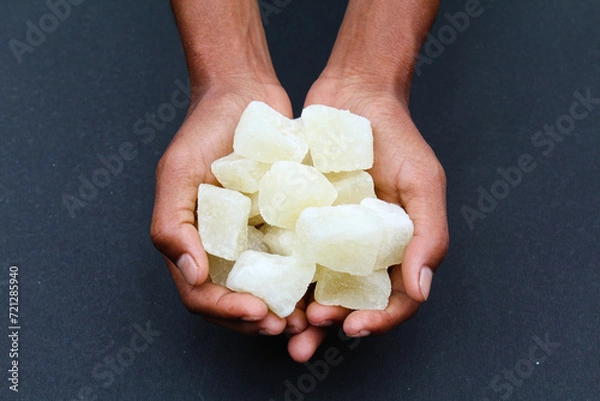 Obraz Holding some sweet Agra petha in hand 