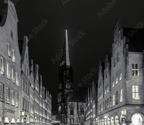 Fototapeta Munster, NRW, Germany. View of St Lambert's Church at dusk. Christmas in Munster