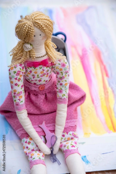 Fototapeta toddler doll on the colorful background, vintage style, selective focus