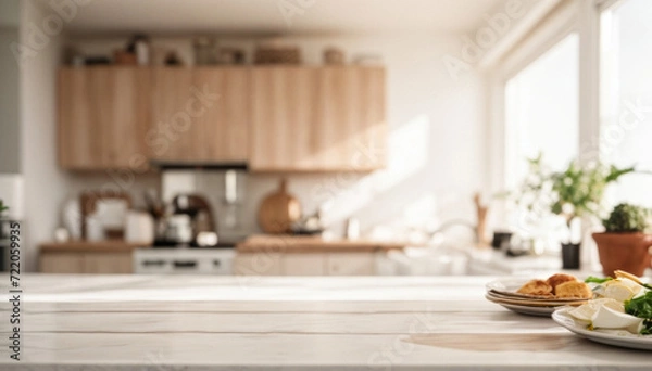 Fototapeta Selective focus on wooden kitchen island. Empty wooden table with copy space for display products. Clean countertop for cooking.