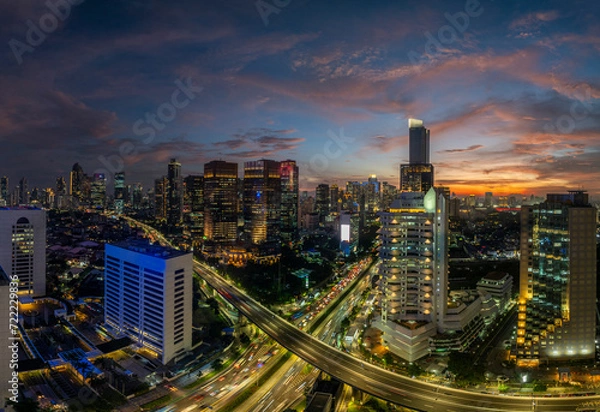 Fototapeta Panoramic view of jakarta City, Indonesia, with beautiful sunset. Jakarta is the largest city in indonesia that also the center of governance and business district. 