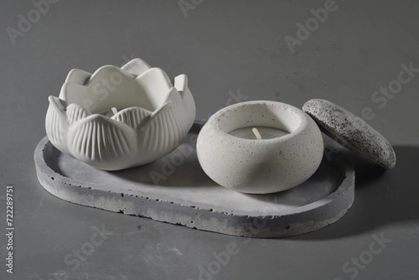 Obraz Candle holder on gray background. Ceramic candlestick.